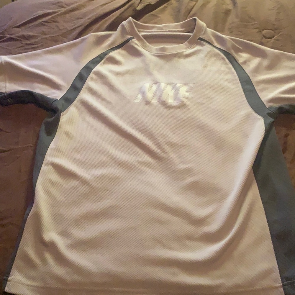 Large light brown Nike shirt